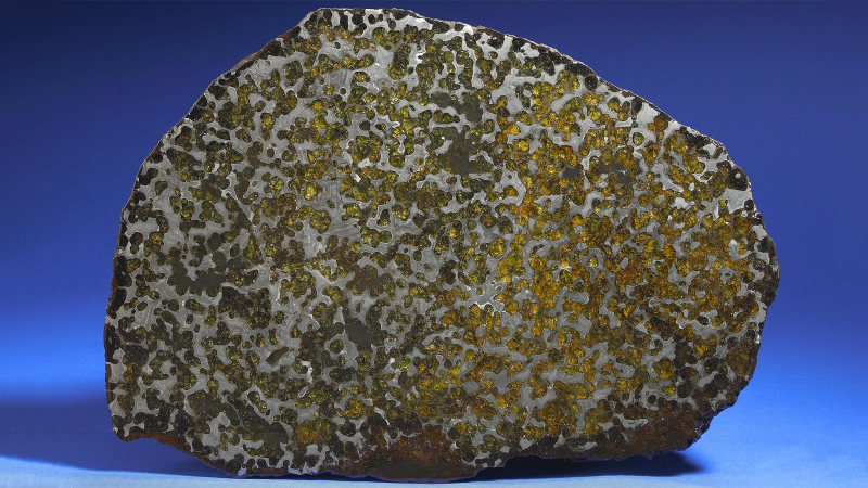 Illustration for article titled 30 Starry Wonders Hiding Inside of Dull Meteorites